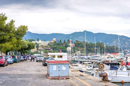 Beautiful daylight view to water and Santa Margherita Ligure city. Old sidewalk with trees. Italy near Cinque Terreのeditorial素材