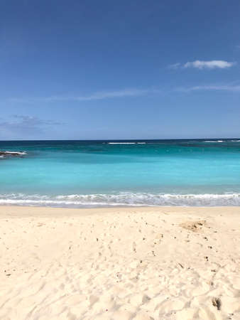 Beautiful daylight view from beach line to blue sea and waves, white sands. Grand Port District, Mauritius islandの写真素材