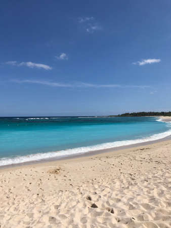 Beautiful daylight view from beach line to blue sea and waves, white sands. Grand Port District, Mauritius islandの写真素材
