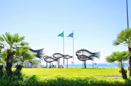 CAGNES-SUR-MER, FRANCE - JUNE 29, 2017: Daylight sunny view to Shoal of Fish by Sylvain Subervie. Made out of wrought iron, this sculpture consists of 12 fish of varying sizes from 2 to 4 metresのeditorial素材