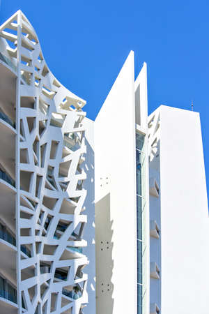 MONTE CARLO, MONACO - JUNE 29, 2017: Daylight view from bottom to latticed facade of Simona Tower...