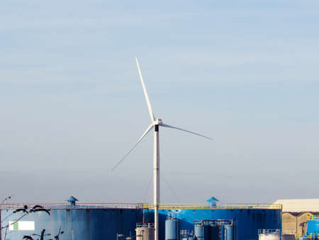 a wind turbine against the background of blue sky. Southport, England