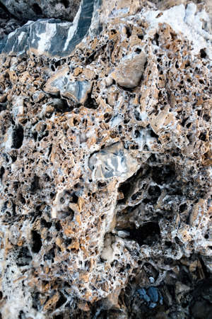 Rock near the Mediterranean sea coast in Savona, Italy