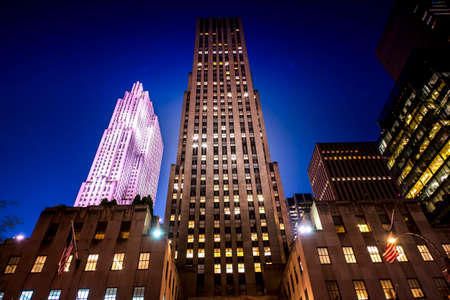 A skyscraper at night in New York, USA. Vibrant colorsの写真素材