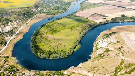 Aerial drone view of nature in Moldova. Dniester river with fields and rocky coastsの写真素材