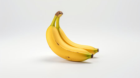 Two bananas on a white backgroundの素材