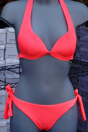 Mannequin with red swim suite in the streetの写真素材