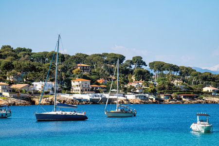 White boat on the sea near the beaches in Antibes, France,の写真素材
