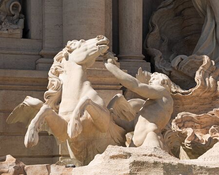 Triton and Hippocamp. Detail of the Trevi fountain, Rome, Italyの写真素材