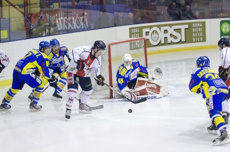 MILAN - NOVEMBER 1   F  Doyle check the puck by D  Iori   HC Milan  on the game HC Milan - HC Fassa   Italian Premier  League   on November, 1, 2012,  in Milan  Italy のeditorial素材