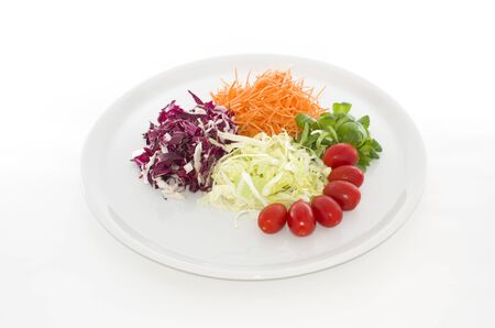 Salads food in white plate in white backgroundの写真素材