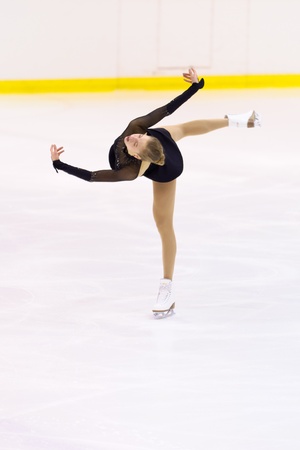 MILAN-DECEMBER 22  Carolina Kostner  perform in Italian Championships of Figure Skating 2012 on December 22 , 2012 in Milan, Italyのeditorial素材