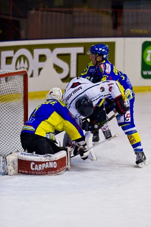 MILAN - JANAURY 2   F  Doyle check the puck by Knackstedt   HC Milan  on the game HC Milan - HC Fassa   Italian Premier League   on January, 2, 2013, in Milan  Italy のeditorial素材