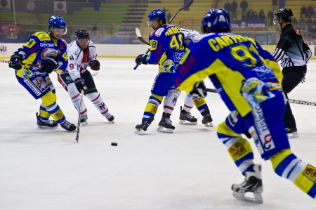 MILAN - JANAURY 2   F  Doyle check the puck by Knackstedt   HC Milan  on the game HC Milan - HC Fassa   Italian Premier League   on January, 2, 2013, in Milan  Italy のeditorial素材