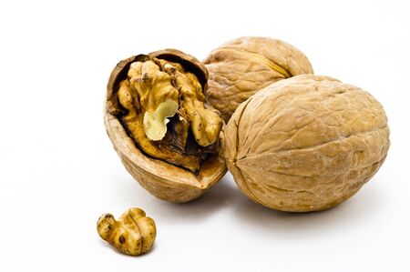 big yellow nuts isolated in white backgroundの写真素材