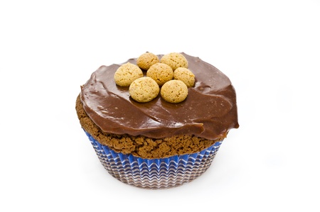 chocolate muffin with italian pastries called amaretti and cream isolated in white backgroundの写真素材