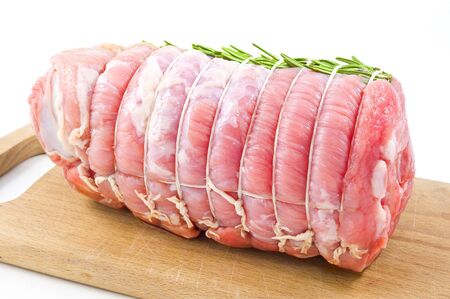 roast of veal with rosemary in white backgroundの写真素材