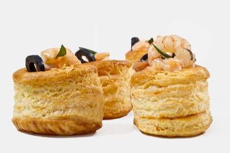 voulevant with shrimps and olives sauce on white backgroundの写真素材