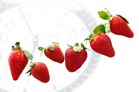 strawberries on clockの写真素材