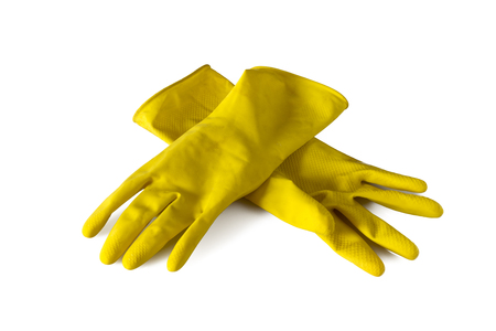 Yellow rubber gloves isolated on white backgroundの写真素材
