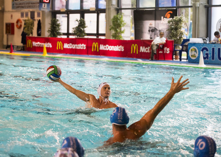 MANTOVA, SEPTEMBER, 26:  Andrea Razzi (  Bpm Sport Management )  shooting the ball in game BPM Sport Management - Rari Nantes Bogliasco  - Water Polo Italian Cup,   on September 26, 2014 , Mantova ( Italy).のeditorial素材