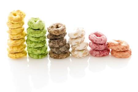 Traditional Italian snack called   Taralli with sugar and glassa in white backgroundの写真素材