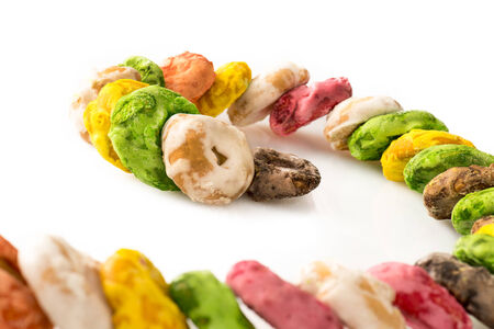 Traditional Italian snack from Puglia, called Taralli with sugar and glassa in whiteの写真素材