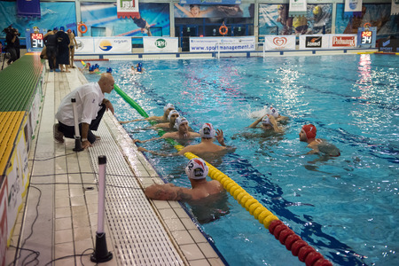 MILAN,  JANUARY  22: G. Averaimo, coach  Bpm Sport Management,  talking to the team   in game BPM Sport Management -Canottieri Napoli  on January 22, 2015 , Milan( Italy).のeditorial素材