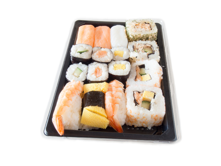 Sushi packs for supermarket in white backgroundの写真素材