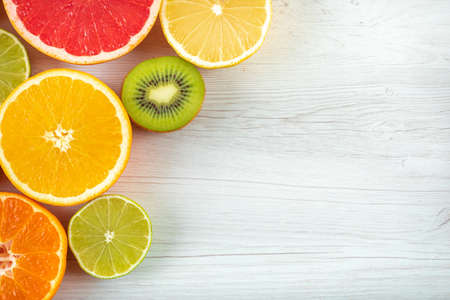 Top view citrus fruits with copy space on white background