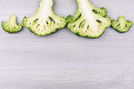 Organic, fresh broccoli with copy space on wooden backgroundの写真素材