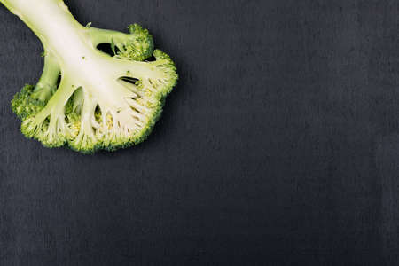 Fresh broccoli with copy space on black backgroundの写真素材