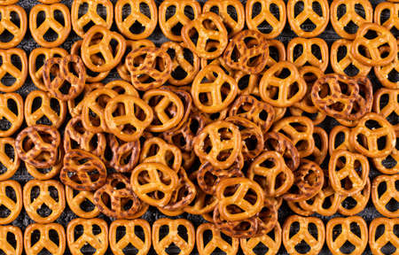 Top view of crackers texture on dark background horizontalの写真素材