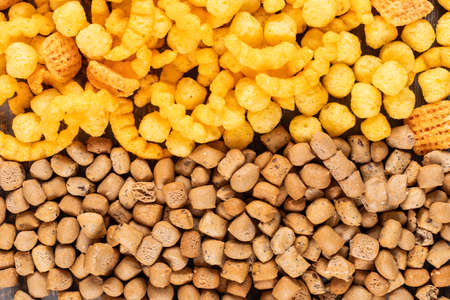 Top view of crackers with corn balls texture horizontal