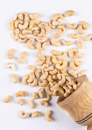 Set of scattered on table cashew on a white background. top view.の写真素材