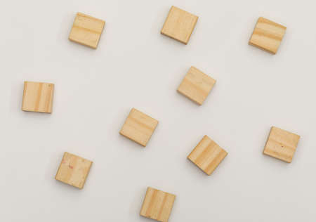Wooden blocks on white background, flat lay.