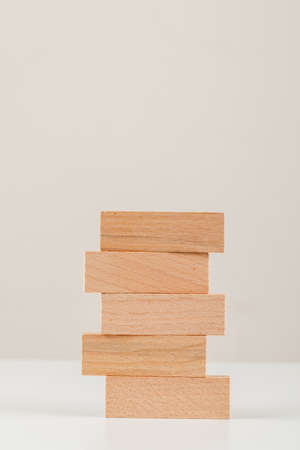 Wooden blocks on white background, side view.の写真素材