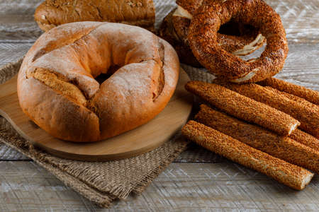 High angle view bagel in cutting board with turkish bagel on gray background. horizontal の写真素材