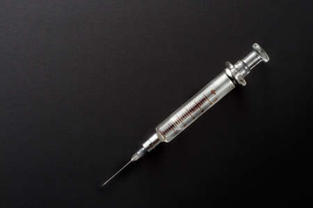 Syringe on Blackの写真素材