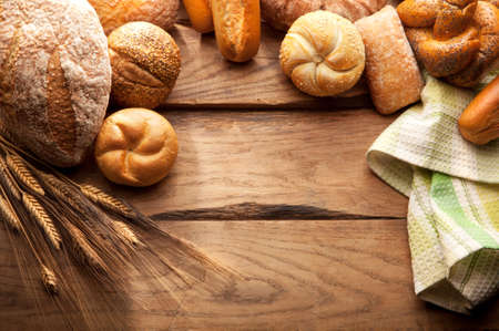 Variety of Bread on wooden tableの写真素材