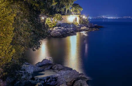 A night scenery of a bay in Opatija on Croatian coastの写真素材