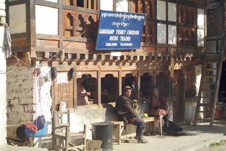 Bhutan, peasants from Merak village in Eastern Bhutan in front of the general store of Rangjung in Gamri valleyのeditorial素材