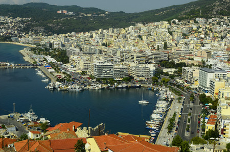 Kavala, Greece - City view with harbor, ships, buildings and promenade in the city in Eastmacedoniaのeditorial素材