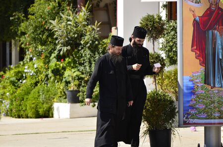 Ouranoupoli, Greece - unidentified monks named Pope in the border village on way to Holy Mount Athosのeditorial素材