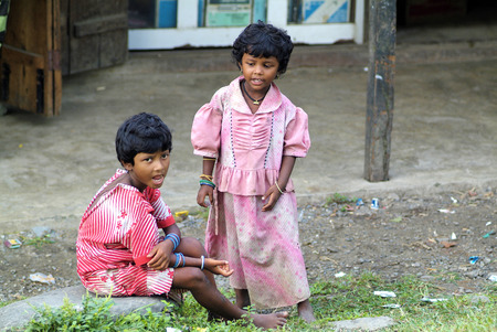 Assam, India - September 30th, 2007: Unidentified female children in poorly and dirt clothes, Indian inhabitants on the border to Bhutanのeditorial素材