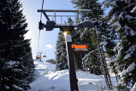 St. Jakob, Austria - March 3rd 2015: Chairlift to mountain station on Buchensteinwand mountain, a preferred ski resort in Tyrolのeditorial素材