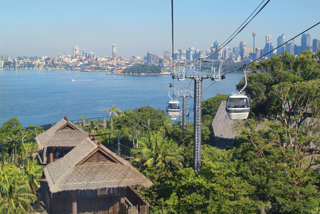 Sydney Australia May 10th 2010: Cable car from Port Jackson to station of Taronga Zoo with skyline of Sydneyのeditorial素材