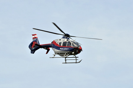 Eisenstadt, Austria - May 14th 2011: police helicopter - Eurocopter EC 135 - in operation for an accidentのeditorial素材