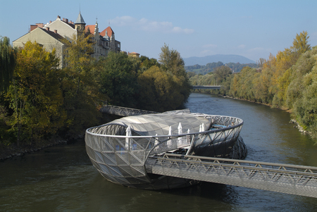 Graz, Austria - October 13th 2010: Murinsel -  designed from American architect Vito Acconci and built for the European Cultural Capital 2003 activitiesのeditorial素材