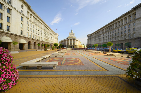 Sofia, Bulgari: square Ploshtat Nezavisimost with building of the former comunist party (The Largo) middle, left central department store and ministries, right president's office and ministriesのeditorial素材